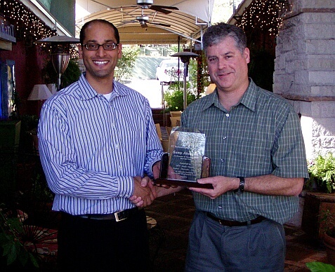On the left, Samy Aboel-Nil, Co-founder and the Vice President of Product Technology for MessageOne is honored as Austin's Information Technologist of the Year by AITP President Keith Stone